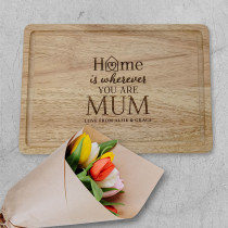 'Home is wherever you are Mum' Personalised wooden chopping board 