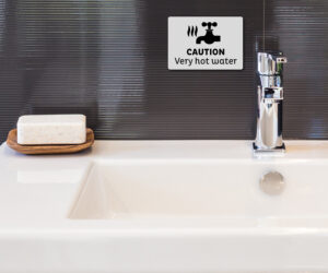 en054 en055 caution very hot water notice